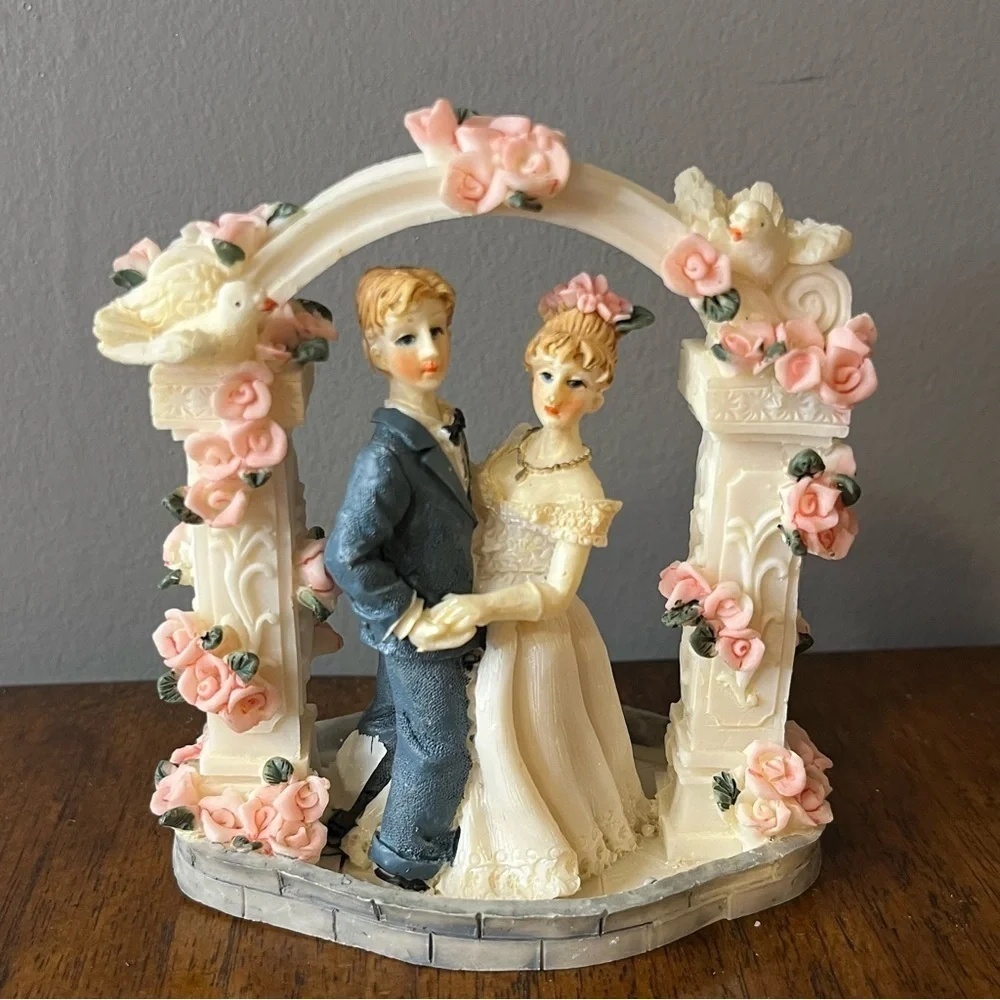 Vintage wedding cake topper. Romantic Wedding Couple Figurine with Pink Roses